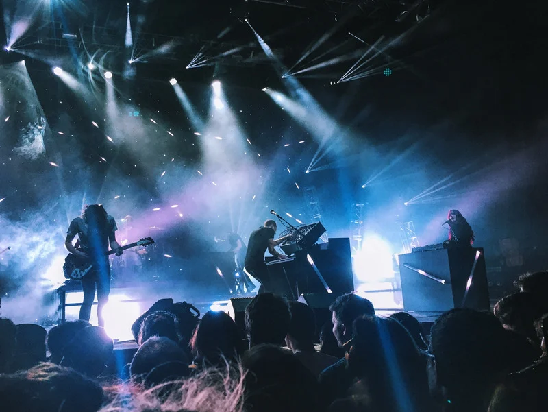 Band performing on stage at a Bold Music concert